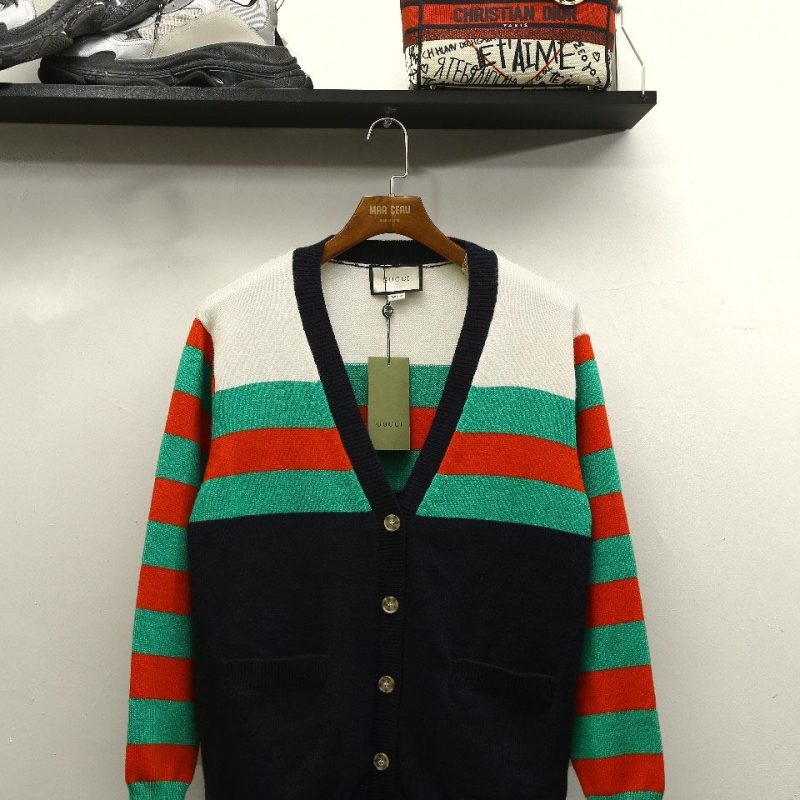 G*u*i coats
